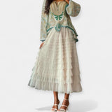 Elegantna Suknja s Tulom i Dekorativnim Detaljima