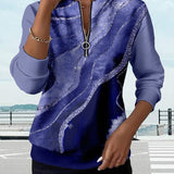 Arlena – moderna bluza s apstraktnim uzorkom i patentnim zatvaračem