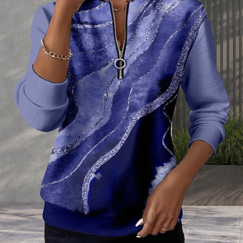 Arlena – moderna bluza s apstraktnim uzorkom i patentnim zatvaračem