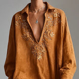 Slobodne midi haljine s printom i V-izrezom