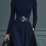 Tamno plave pletene haljine s visokim ovratnikom